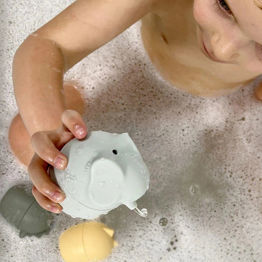 Child playing with Cherub Baby  Silicone Squeeze and Squirt 5 Pk in the bath