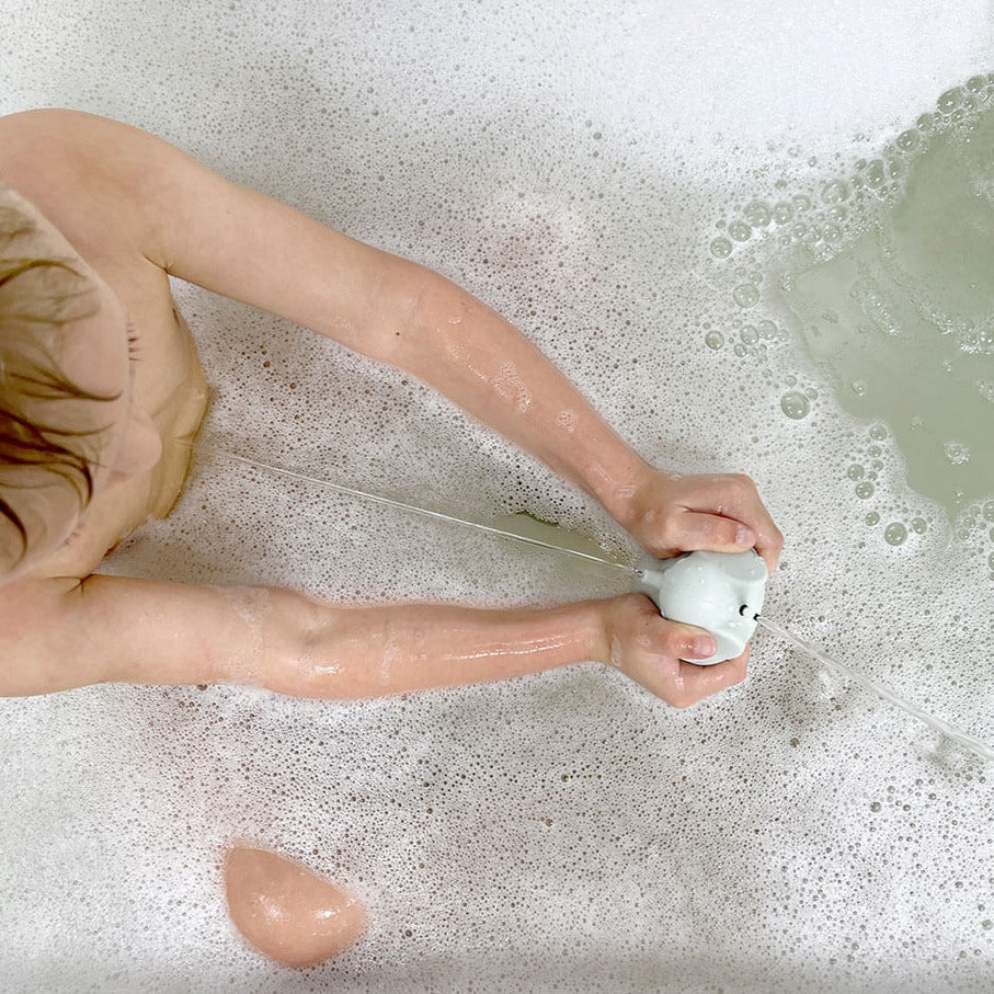 Child playing with Cherub Baby  Silicone Squeeze and Squirt 5 Pk in the bath