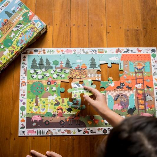 Child playing with farm theme puzzle