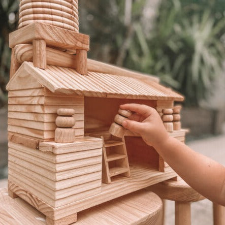 Explore-Nook-Eco-Hut-Water-Wheel played with by a child